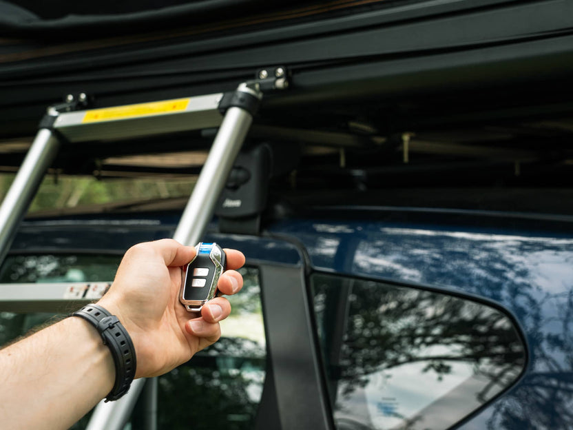 ASCA - TentBox Security Alarm person showing how to use remote control