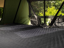 Side view of TentBox Lite XL tent interior with mattress topper fully laid out – ultimate roof tent comfort