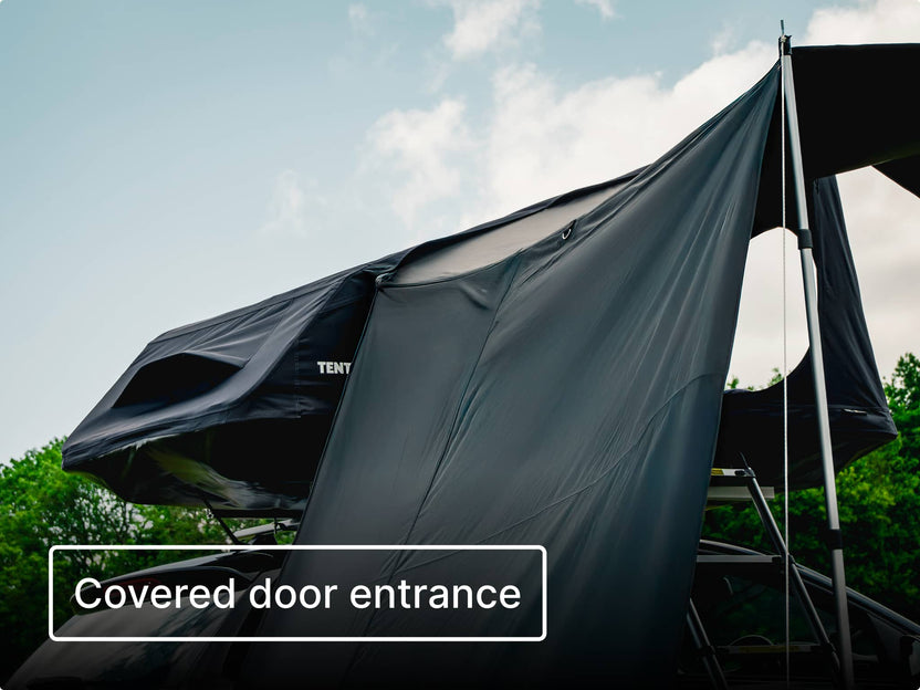 Close up of the TentBox GO Tunnel Awning with trees and sky in the background.